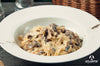 Fetuccini Alfredo con pollo y champiñones